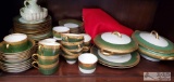 Very unique and antique!! Full set of green and gold Limoges France dishes with serving pots, and