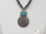 Beautiful Artist Marked Sterling Pendent with a Authentic Morgan Silver Dollar (chain not included)