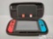 Nintendo Switch w/ Case and Two Games