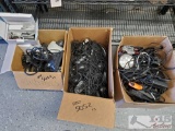 Three boxes of various cords, security camera equip., and more!
