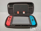 Nintendo Switch w/ Case and Two Games