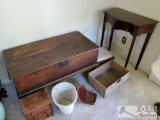 Large wood trunk, desk, small stool, and various baskets and jewelry box