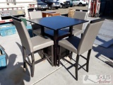 Dining Table w/ Four Chairs