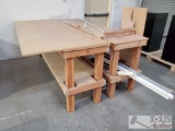 Two Wooden Work Tables w/ misc PVC pipes