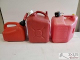 Three Plastic Gas Cans 1 - 2 1/2gal