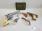7 Toy cap guns Pistols