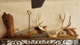 Metal Shelf with Antlers, Decorative Saws, Metal Book and More