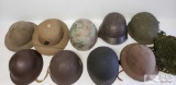 9 Military Helmets With Two Helmet Covers.