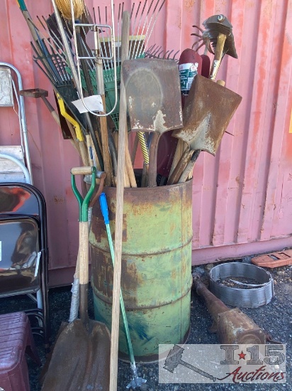 Metal Barrel With Shovels, Rakes, Brooms and Other Tools