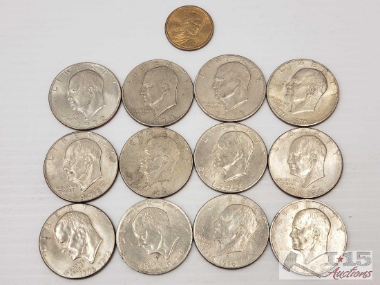 12 Eisenhower Dollars, and 1 Sacajawea Dollar, 280.6g