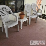 3 White Plastic Chairs, End Table and Pottery