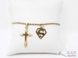 14m Gold Rope Bracelet W/ Cross And Superman Pendant, 4g