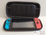 Nintendo Switch, Comes With Case, and 5 Games