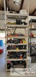 Plastic Shelving Unit With PVC Couplings, Hose Clamps, Vaccum Attachments, And More