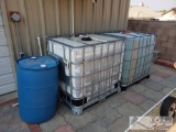 Two 275 Gallon Liquid Containers And 55 Gallon Barrel