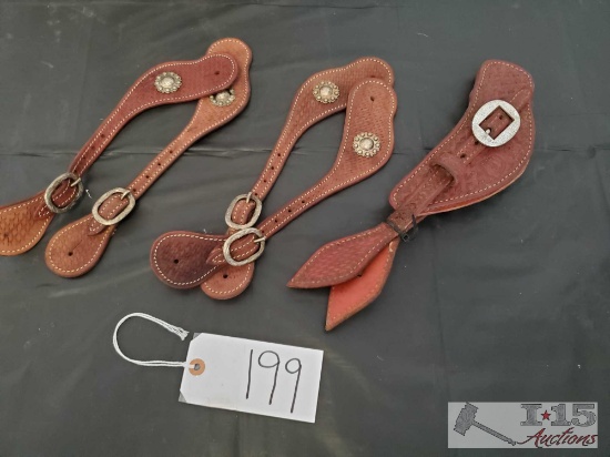 Three Sets of Leather Spur Straps with some silver conchos