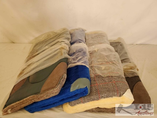 Four New Saddle Pads