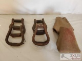 Two Sets of Cowboy Stirrups and a set of Kids Tapaderos