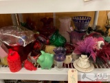 Candle Holders, Candles, Porcelain Masks and a Piggy Bank