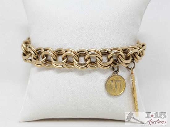 14k Gold Charm Bracelet, 39.6g