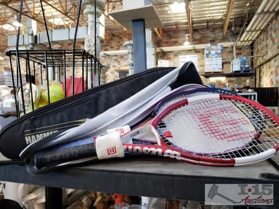 One Basket of Tennis balls and Three Tennis Rackets