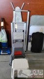 7 Plastic Step Stools, 2 Metal Step Ladders, And Ironing Board