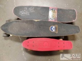Two Longboards and One Penny Board