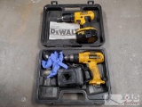 Two Dewalt Screw Guns with battery and battery charger