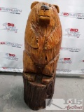 Wood carving of bear