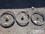 One Front Bicycle Tire and Two Rear Tires