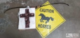 Bow, Caution Horse Sign, and Decorative Cross