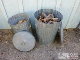 2 Metal Trash Cans With Wood Scraps
