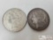 One 1879 E. Pluribus Unum Coin And One 1921 E. Pluribus Unum One Dollar Coin