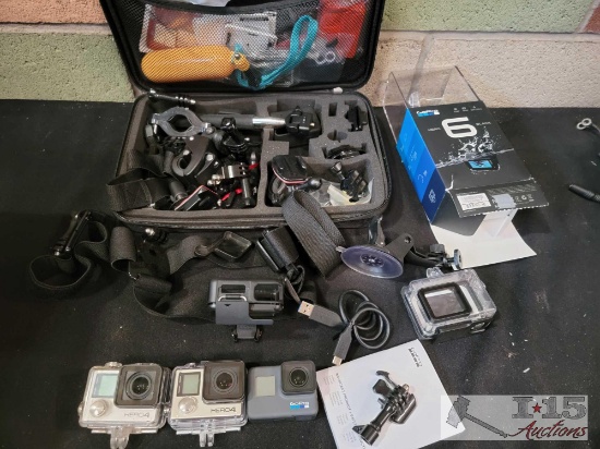 2 GoPro Hereo 4, 1 GoPro Hero 6 and Case Full of Accessories