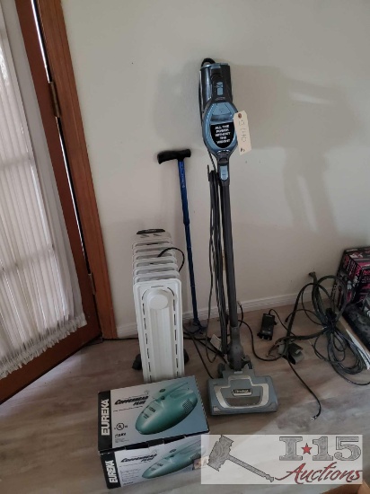 Vacuums, a Heater, and Cane