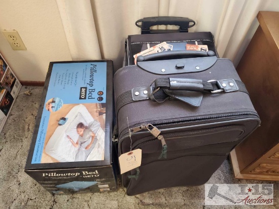 Suitcase, Rolling Cooler and Pillowtop Bed