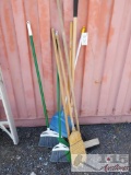 4 Brooms 1 push Broom, and 3 Rakes