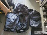 1 Duffle Bag, 4 Backpacks and one laptop bag.