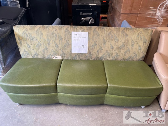 Green Leather Couch with Giraffe Print