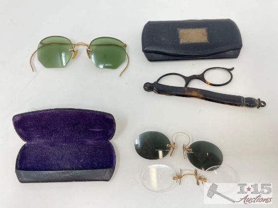 (4) Pairs of Glasses and (2) Cases