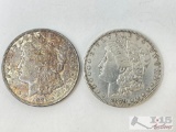 (2) 1879 & 1921 Morgan Silver Dollars