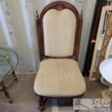 Wooden cushioned chair