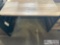 gray desk and small side table with drawers