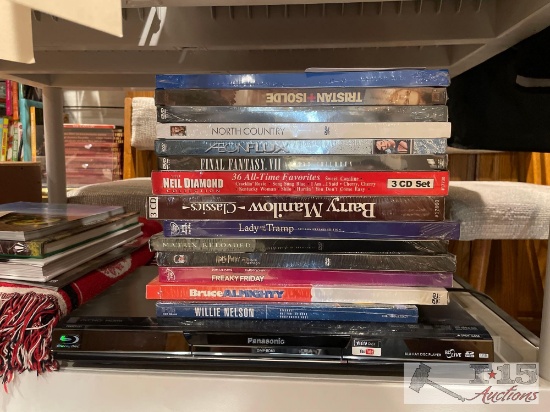 Panasonic Blu-Ray Player with Unopened DVDs and CDs