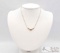 14K Gold Round & Baguette Diamond Necklace, 4.02g
