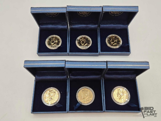 (6) 2004 Gold Toned Kennedy Half Dollars