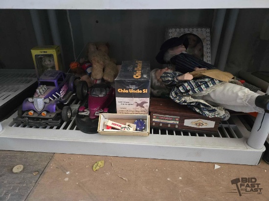 Porcelain Dolls, Duck Dynasty Chia Pet, Wooden Music Box, Stuffed Animals