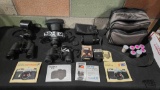 Camera, Camera Lenses, Binoculars, Film, Camera Bag and User Manuals