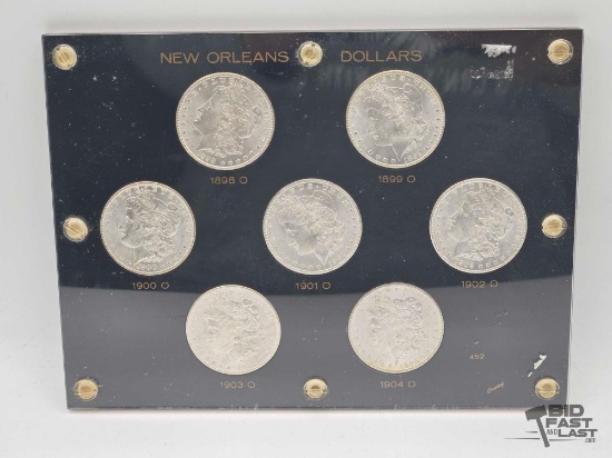 (7) 1898-1904 Morgan Silver Dollars