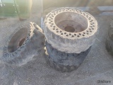 (4) Solid Bobcat Wheels and Tires